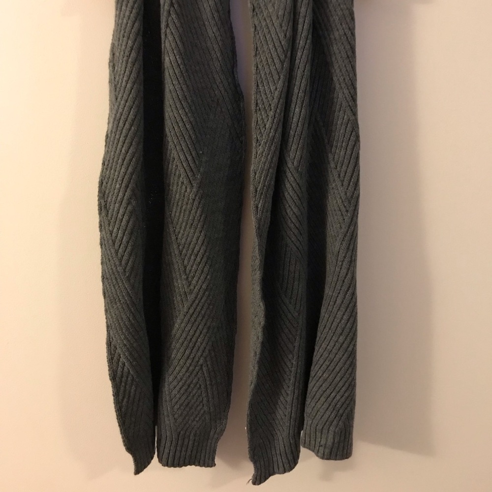Gray scarf.
